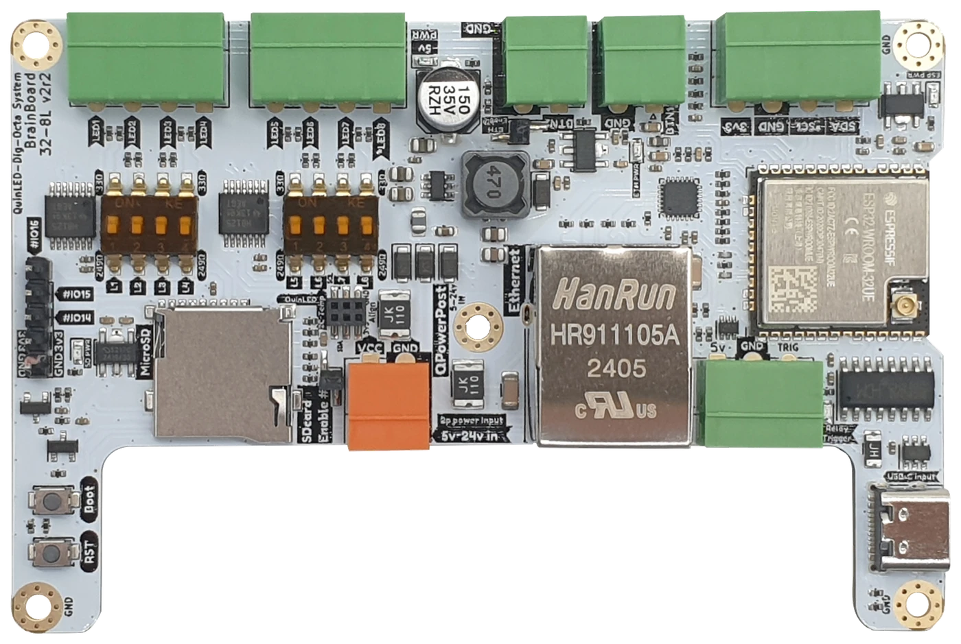 QuinLED-Dig-Octa Brainboard-32-8L v2: white PCB with ESP32 module, RJ45 Ethernet jack, green pluggable LED terminals and orange power input